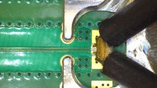 Figure 4: Delta‑L 4.0 probe and test board from PacketMicro